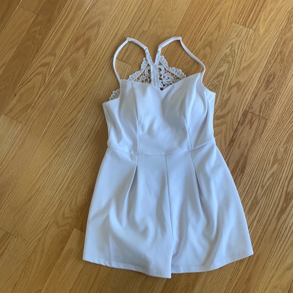 Francescas white romper adjustable straps